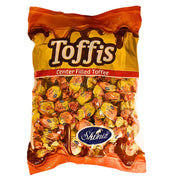 Påse med iranska centerfyllda karameller Toffis, 1 kg, i orange och gul förpackning