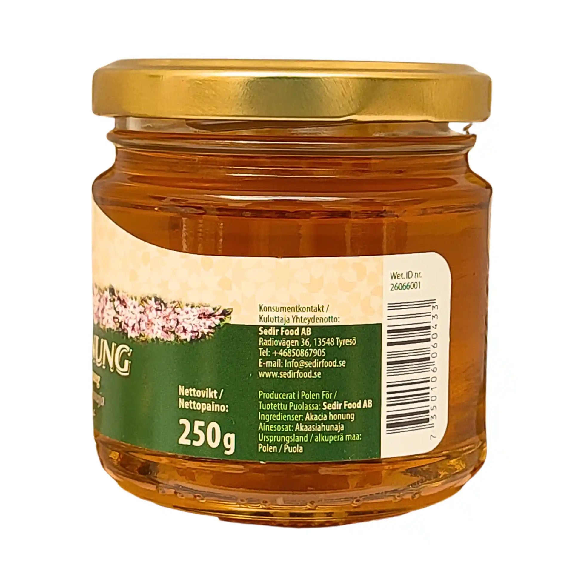 Glasburk med akaciahonung 250g, guldfärgat lock, produktetikett på sidan.