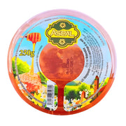 Asbal honungskaka i rund plastförpackning, 250g, med honungskakbild och blommor på etiketten.