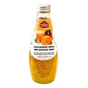 Flaska med basilika frödryck mango, exotisk dryck med basilika- och mangosmak.