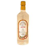 Flaska med apelsinblomvatten, orientaliskt extrakt, 1 liter, vit etikett och guldlock.