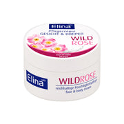 Elina Wildrose hudvårdskräm i vit burk med rosa lock och blomdekoration