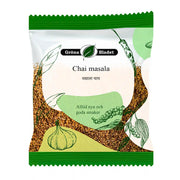 Gröna Bladet Chai masala kryddmix 30g för te, illustrerad förpackning med grönsaker och kryddor.